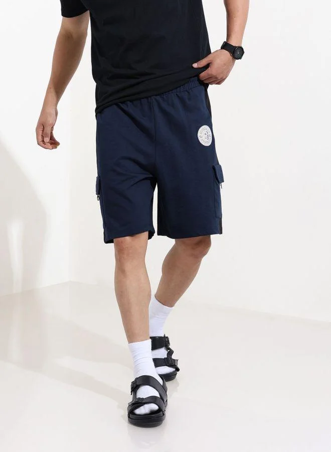 ذا انديان كراج كو Men Oversized Fit Superman Printed Cargo Pocket Mid-Rise Shorts